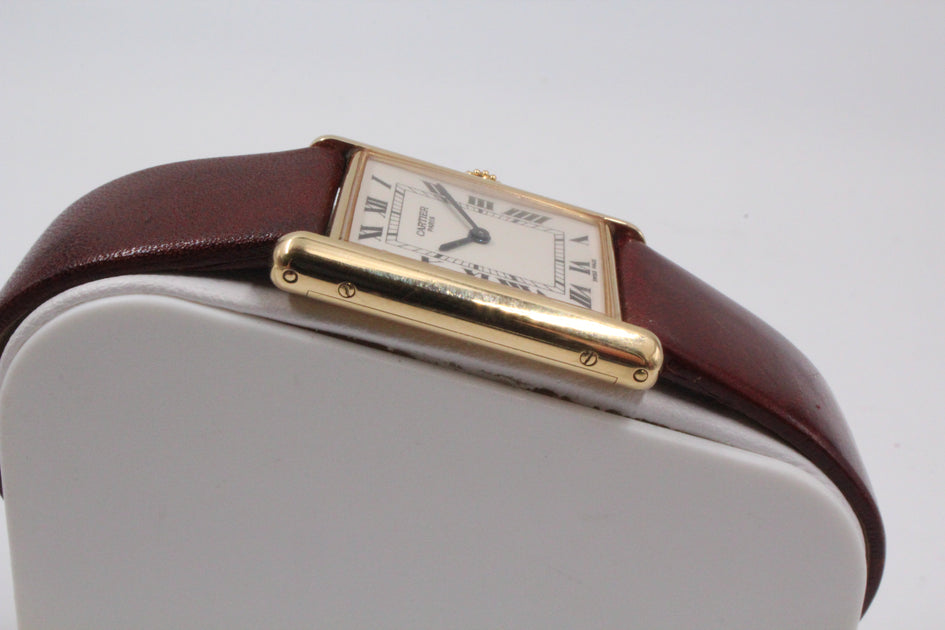 Bonhams : Cartier Tank Louis Cartier, A Yellow Gold Bracelet Watch, circa  2000